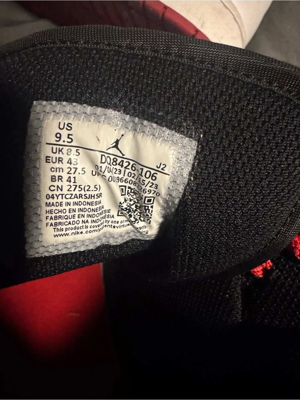 Jordan High-Top Sneakers in Black, White, and Red